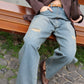 JEANS LARGO SLAVATO CON CINTURA
