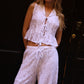 GILET IN PIZZO CON LACCI BIANCO