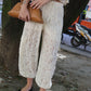 PANTA IN PIZZO CON TASCONI