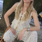 GILET IN PIZZO CON LACCI PANNA